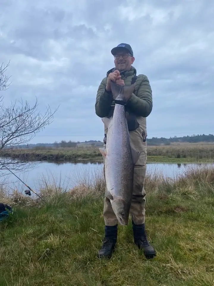 Lars with a 12.9 kg salmon - 110 cm and condition factor 0.969