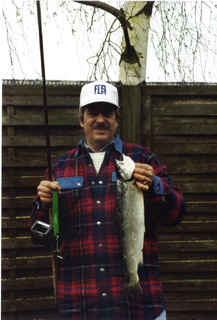 I stand with a sea trout of 1.4 kg