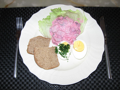 Red herring salad of own marinated spicy herring