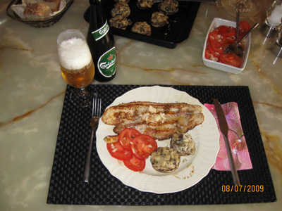 Pangasius fillet with mushrooms and garlic cheese