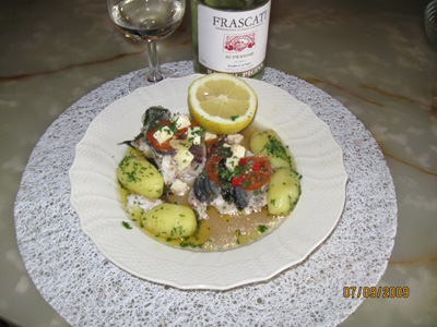 Cod baked in aluminium foil with Feta or Apetina cheese and culinary herbs