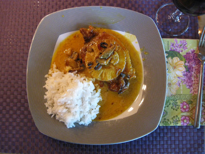 Oriental curry chops in dish with rice