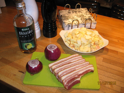 Ingredients for apple pork with red onion and homemade bacon for 2 people