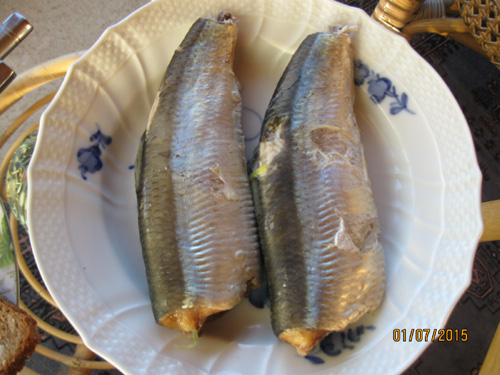 Cooked salt herring for breakfast or lunch à la Langeland